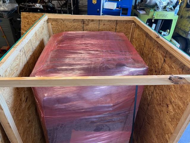 Shipping manufacturing equipment with export-ready protective crating